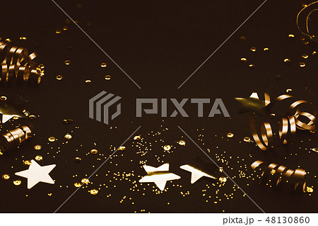 Golden decoration on black background. Place for text. Golden decoration on black background. Place for text. 48130860