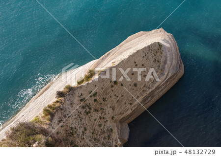 Sandstone formations or cliffs along coastline Sandstone formations or cliffs along coastline 48132729