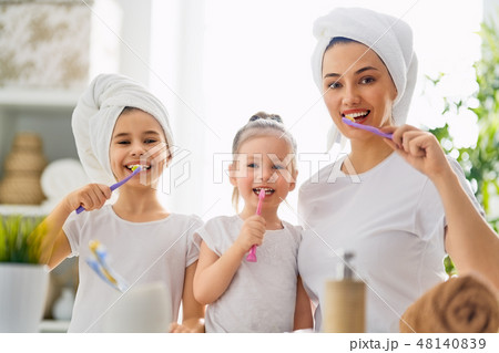 family are brushing teeth 48140839