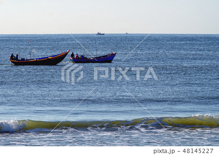 fishermen at work in the Gulf of Mui Ne 48145227
