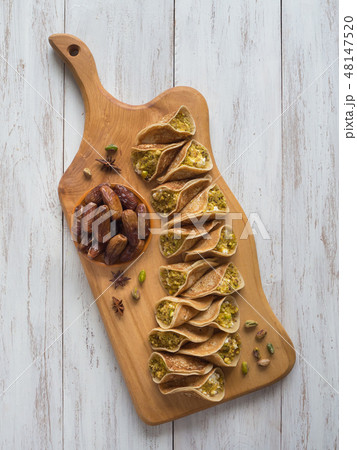 Arabian pancake stuffed with sweet cheese. Arabian pancake stuffed with sweet cheese. 48147520
