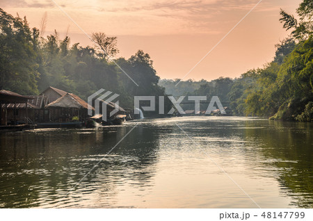 Wooden raft resort with waterfall flowing in river Wooden raft resort with waterfall flowing in river 48147799