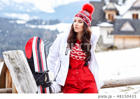 sexy woman with snowboard outdoors sexy woman with snowboard outdoors 48150435