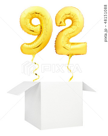 Golden number ninety two inflatable balloon with golden ribbon flying out of blank white box Golden number ninety two inflatable balloon with golden ribbon flying out of blank white box 48151088
