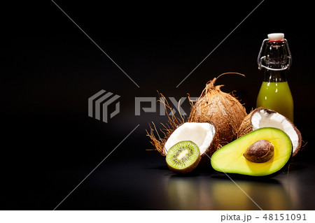 Fresh vegetable juices on black table 48151091