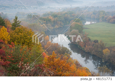 Autumn landscape with river and fog Autumn landscape with river and fog 48151771