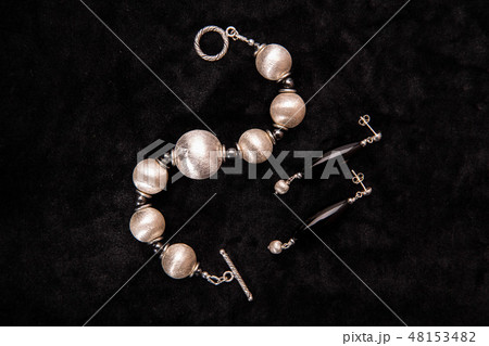 Black earrings with silver beads and a silver 48153482