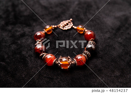 The bracelet with a beads multi-colored suits 48154237