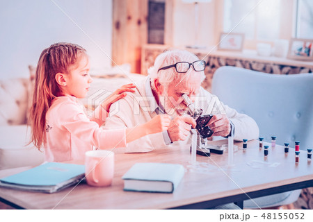 Interested grandpa feeling support while doing research 48155052