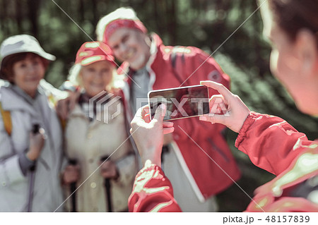 Elderly fashion people posing on phone camera Elderly fashion people posing on phone camera 48157839