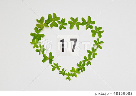 Number 17 to celebrate St Patrick's Day in green heart frame Number 17 to celebrate St Patrick's Day in green heart frame 48159083