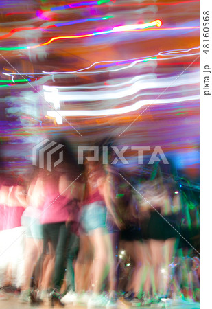 Unrecognizable crowd of ypung people 48160568