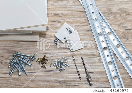 Installation of chipboard furniture in a carpentry Installation of chipboard furniture in a carpentry 48160972