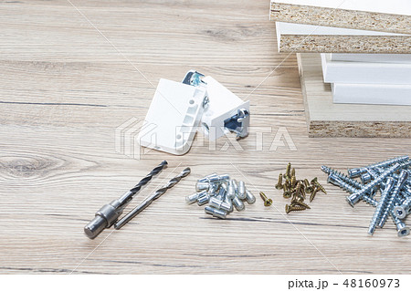 Installation of chipboard furniture in a carpentry Installation of chipboard furniture in a carpentry 48160973