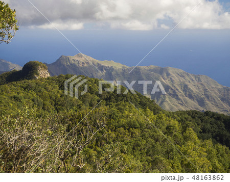 view point Amogoje with pitoresque green hills and bush, sharp rock peaks and sea in anaga mountain view point Amogoje with pitoresque green hills and bush, sharp rock peaks and sea in anaga mountain 48163862