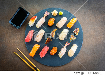 Nigiri sushi set with salmon tuna shrimp prawn eel shell and other sashimi 48168856