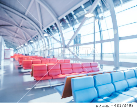 Abstract blur and defocused airport terminal interior Abstract blur and defocused airport terminal interior 48173498