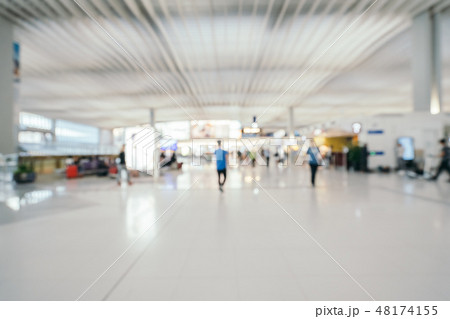 Abstract blur and defocused airport terminal interior Abstract blur and defocused airport terminal interior 48174155