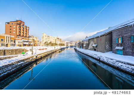Beautiful landscape and cityscape of Otaru canal river in winter and snow season 48174663