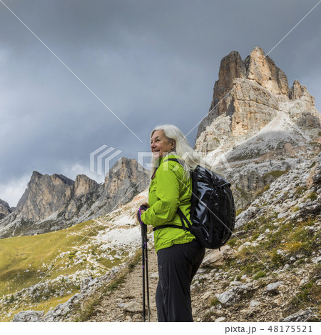 Woman hiking in the Dolomites, South Tyrol, Italy 48175521