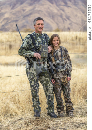 Man hunting with his granddaughter 48175559