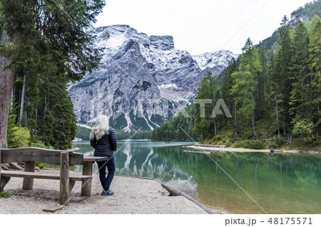Woman by Pragser Wildsee in South Tyrol, Italy 48175571