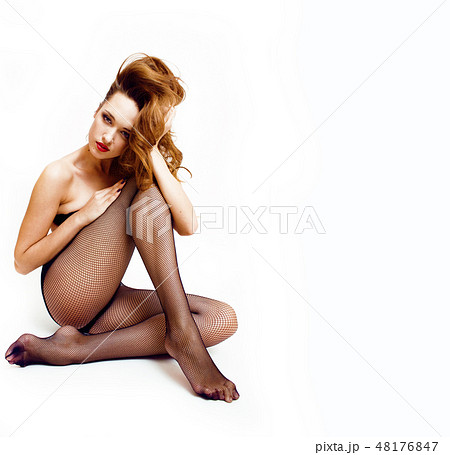 Sexy young woman in black pantyhose and lingerie, red lips, sexy look 48176847