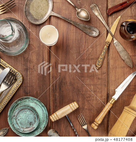 A photo of many vintage kitchen objects and cutlery from an old restaurant, flea market stuff, shot A photo of many vintage kitchen objects and cutlery from an old restaurant, flea market stuff, shot 48177408