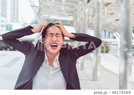 Young depressed businesswoman Young depressed businesswoman 48178369