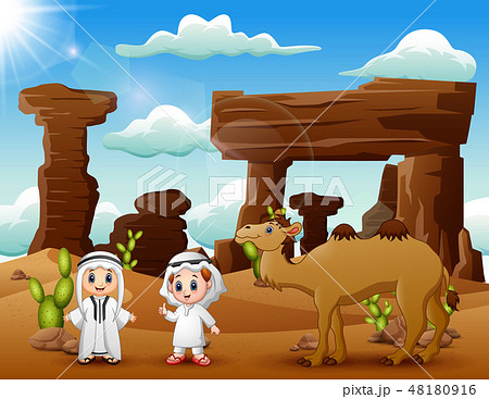 Two arab boys with camels in the desert Two arab boys with camels in the desert 48180916
