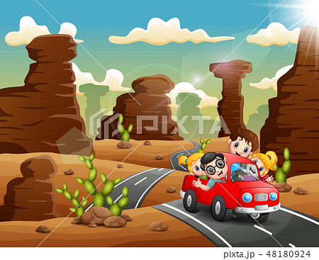 Happy children traveling by red car through Happy children traveling by red car through 48180924