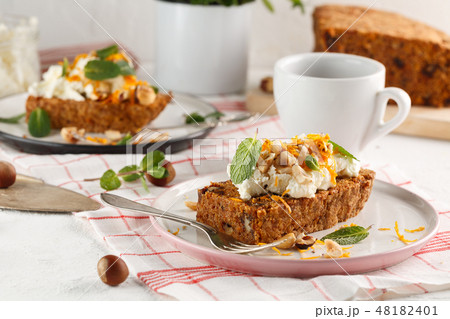 carrot fruit cake with nuts and cream carrot fruit cake with nuts and cream 48182401