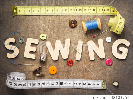 sewing tools and accessories on wooden table sewing tools and accessories on wooden table 48183256