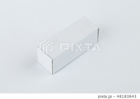 Close up of a small white cardboard box , isolated on white background Close up of a small white cardboard box , isolated on white background 48183643