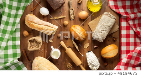 bread and bakery ingredients on wood 48184675