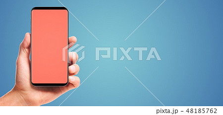 hand holding bezel-less smartphone 48185762