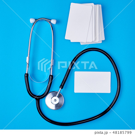 medical stethoscope and empty paper business cards 48185799