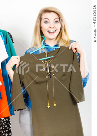 Happy woman clothes shopping Happy woman clothes shopping 48185916