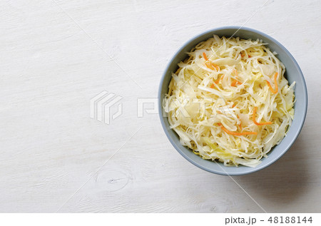 Top view of bowl with cabbage and carrot 48188144