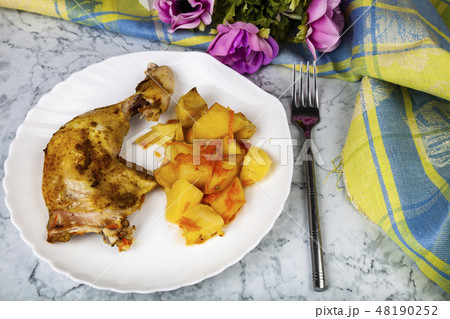Fried chicken legs with potatoes Fried chicken legs with potatoes 48190252