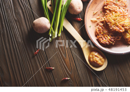 Top view at flat lay tasty potato pancakes Top view at flat lay tasty potato pancakes 48191453
