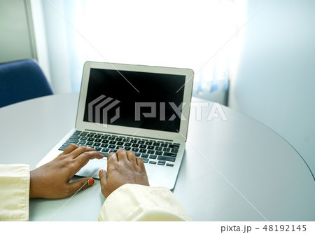 Hands on laptop with black screen for text Hands on laptop with black screen for text 48192145