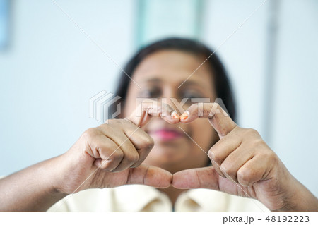 Hand gestures making a love sign Hand gestures making a love sign 48192223