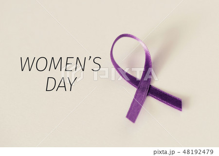 purple ribbon and the text womens day 48192479