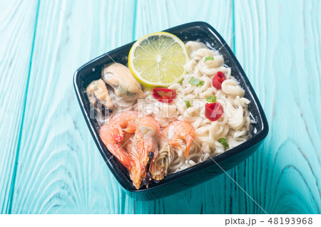 Instant noodles soup shrimps and mssels Asian food 48193968