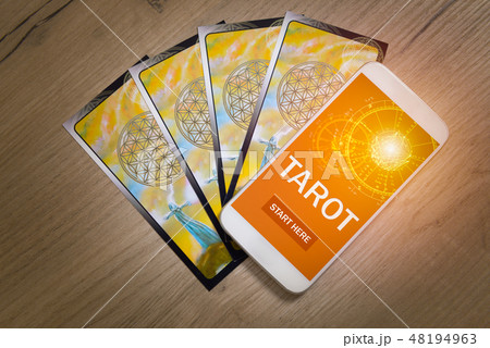 Tarot cards and mobile phone 48194963