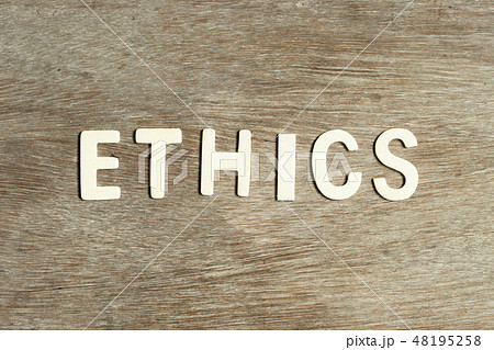 Alphabet letter in word ethics on wood background 48195258
