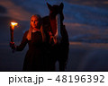 girl with fire and horse at night. Rococo era romance 48196392