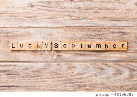 lucky september word written on wood block. 48196688