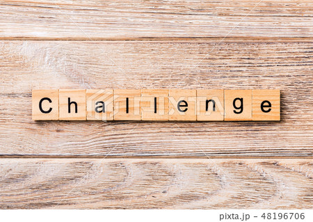 CHALLENGE word written on wood block. 48196706
